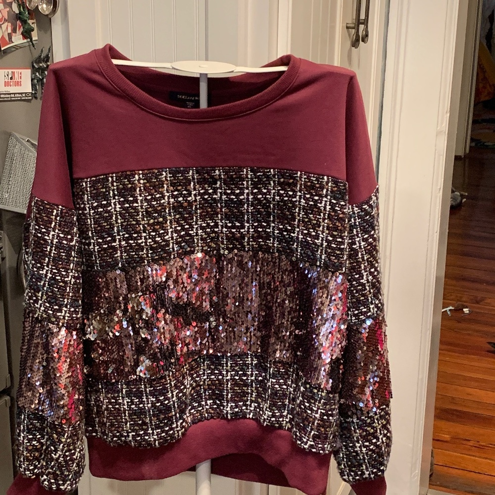 Skies are blue tweed sequin heavy sweatshirt. Never worn . 79 retail